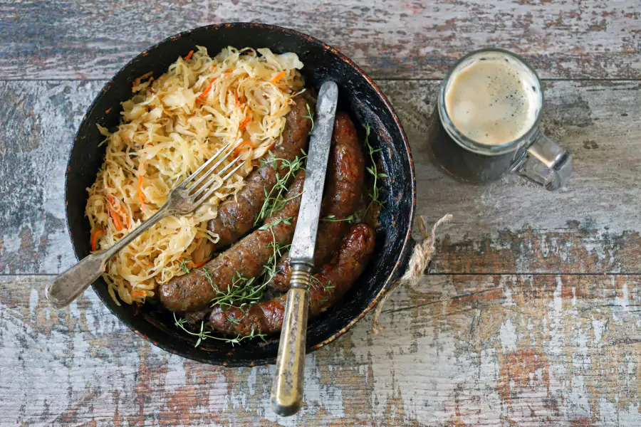 Grilled Bratwurst with Sautéed Sweet Onions and Cabbage
